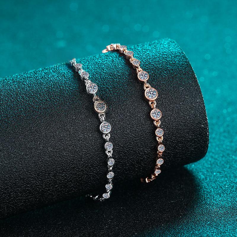 Women's Sterling Silver Moissanite Bracelet with Champagne Gold Finish and Lucky Charm Designs