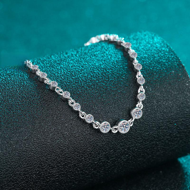 Women's Sterling Silver Moissanite Bracelet with Champagne Gold Finish and Lucky Charm Designs